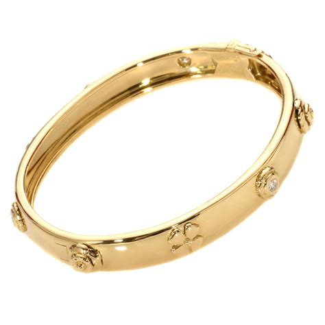 chanel with gold ball|Chanel gold bracelet with diamonds.